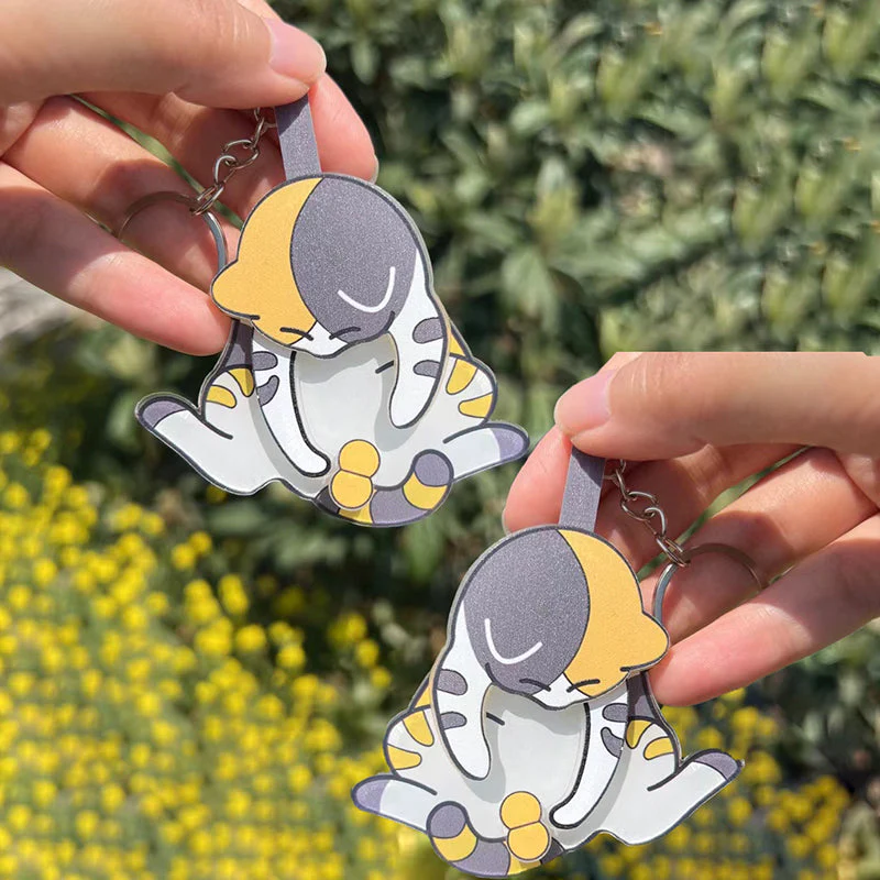 Playing with eggs and kitten keychain - Image 10