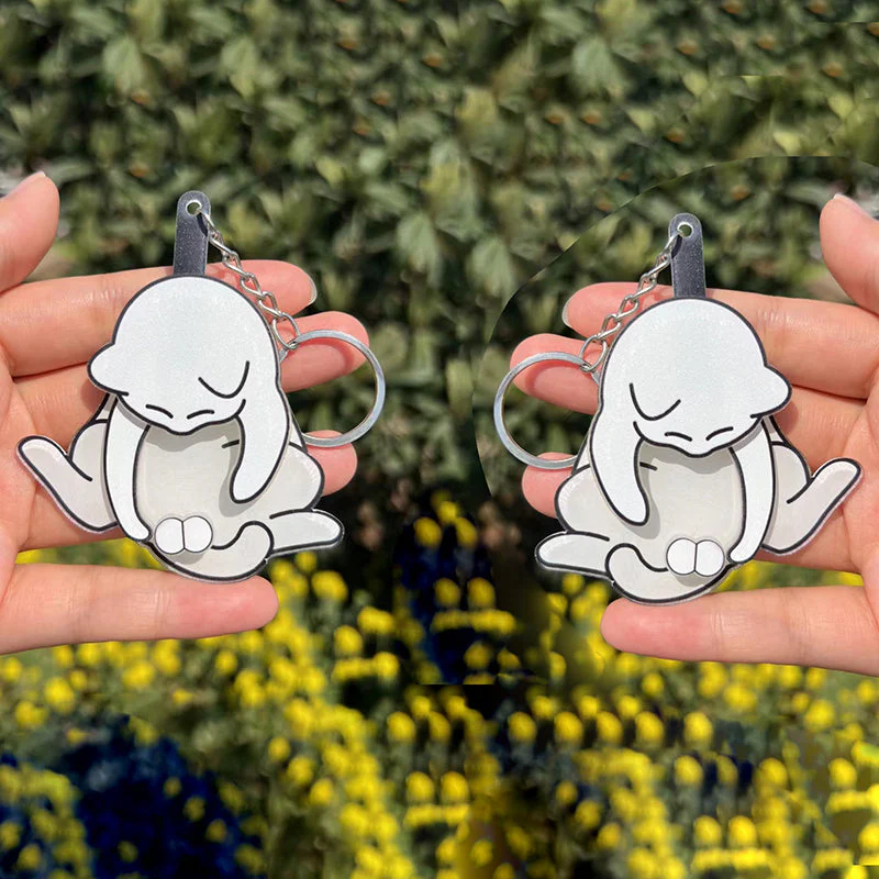Playing with eggs and kitten keychain - Image 3